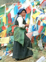 The lady and the prayer flags - Shigatse